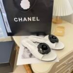 Chanel Black Camellia Slides White - Image 4