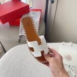 Hermes Oran Sandals Stitching In Brown And White - Image 5